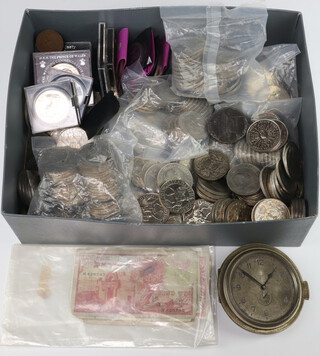 A large collection of various Elizabeth II commemorative crowns and a small collection of bank notes 