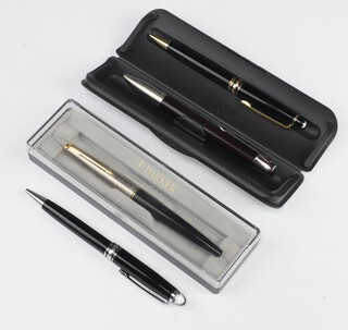A black Mont Blanc ballpoint pen (f), 1 other (f) and a Parker 45 fountain pen cased 