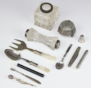 A silver cased propelling pencil holder with engine turned decoration (f), a cut glass inkwell (f) and minor plated items 