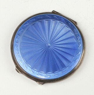 A silver and blue enamelled compact with engine turned decoration Birmingham 1922, gross weight 70grams 