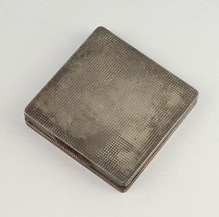 A square silver compact with engine turned decoration Birmingham 1948, gross weight 165 grams 