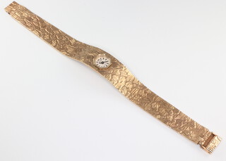 A lady's 9ct yellow gold Milner wristwatch on a textured bracelet 30 grams including the glass 
