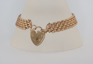 A 9ct yellow gold gate bracelet with padlock 21 grams 