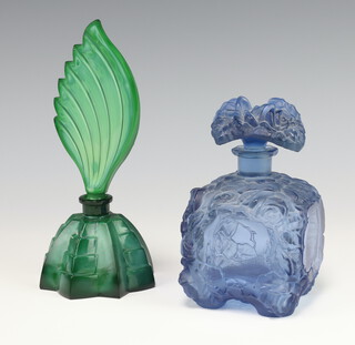 An Art Deco style moulded blue glass scent bottle and stopper decorated with roses 13cm together with a malachite coloured glass scent bottle and stopper 18cm 