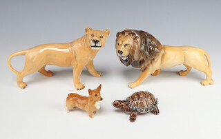 A Beswick figure of a lion facing left no.2089 designed by Graham Tonge 14cm, golden brown gloss, a ditto of a lioness racing right 2097 by Graham Tonge 14.6cm, golden brown gloss, a Beswick Corgi small no.1736, golden brown gloss 7cm and a Wade tortoise box 