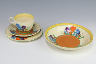 A Clarice Cliff crocus pattern tea cup, saucer, size plate and ditto shallow bowl 