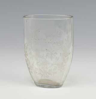 A Victorian engraved clear glass vase with inscription dated 1885 contained in a laurel of flowers 10cm 