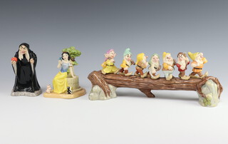 A Disney Showcase Collection Snow White and The Seven Dwarfs - Take The Apple Dearie SW30 15cm, Fairest One of All SW22 14cm and Heigh Ho SW31 34cm, boxed