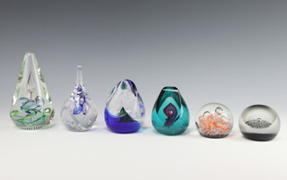 Six Caithness Crystal paperweights - Artisan by Helen MacDonald no.59 17cm, Saladin no.220 9cm, Christmas Carol by Sarah Peterson no.16 of 30 11cm, Twist and Shout by Robert McAteer no.36 of 100 14cm, Arctic Night no.689 of 1500 8cm and Sun Dance no.1657 of 3000 8cm 