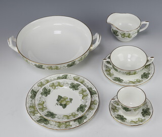 A Royal Worcester - The Worcester Hop Mathon part coffee and dinner service comprising 8 coffee cups and saucers, 8 soup bowls and saucers, cake plate, 8 large dinner plates, 8 dessert plates, 8 side plates, milk jug, gravy boat and 2 stands, 2 coasters, 2 large meat plates, 3 vegetable bowls (1 with lid a/f)  