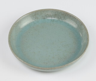 A Chinese green celadon crackle glazed shallow dish 11cm 
