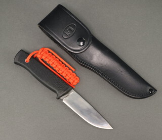 A Fallkniven Thermorun handled knife with 13cm blade contained in a black leather scabbard marked F1 