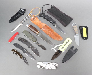 A Whitby Bowie knife with leather scabbard, a Kershaw folding knife with cloth scabbard, an Aitor multi bladed knife, a Golden Colorado folding knife, a McHenry and Williams folding knife blade marked Ast-34, a Spyderco American multi tool with blade, adjustable spanner etc, a ditto double bladed folding knife, Izula camping knife with plastic sheath, a Gerber ditto, a double edged camping knife, a Vlinox double bladed folding knife with corkscrew, plastic grip and 2 sheaths 