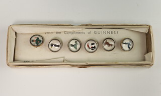 A set of 6 boxed Guinness buttons 