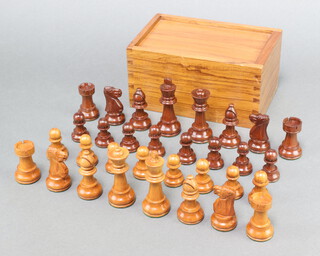 A 20th Century turned wooden Staunton chess set, boxed  