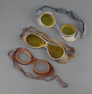 Three pairs of vintage goggles (1 with glass a/f) 