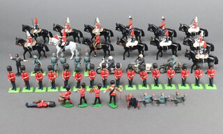 Two Britains metal figures of HM The Queen mounted on Burmese, 10 Britains figures of Household Cavalry Regiment, 16 plastic Britains figures of guardsmen etc 