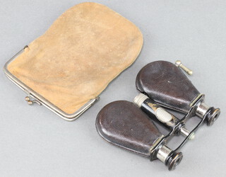 Lemaire Favit, a pair of French 19th Century folding opera glasses contained in a pouch 