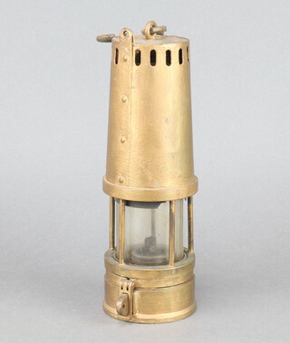 A Richard Johnson gilt painted miner's safety lamp 