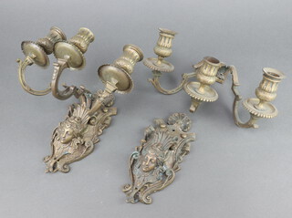 A pair of 19th Century gilt metal 3 light wall light brackets with head decoration 20cm x 24cm x 13cm 