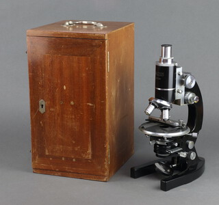 Officine Galileo, a single pillar microscope no.77301 boxed, together with 7 lenses and various slides 