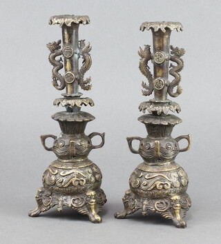 A pair of Chinese gilt metal club shaped candlesticks 25cm 