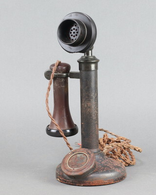 An interior candlestick telephone 