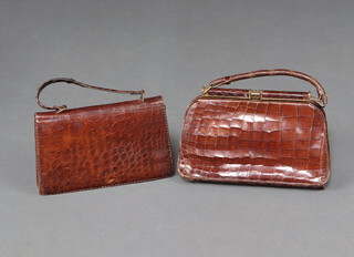 A crocodile handbag 18cm x 27cm x 4cm with chrome mounts and 1 other 19cm x 30cm x 7cm (damage to handle and base) 
