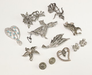A collection of silver and marcasite brooches 