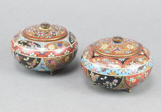 A pair of 19th Century blue and black ground cloisonne enamel jars and covers 5cm x 7cm 