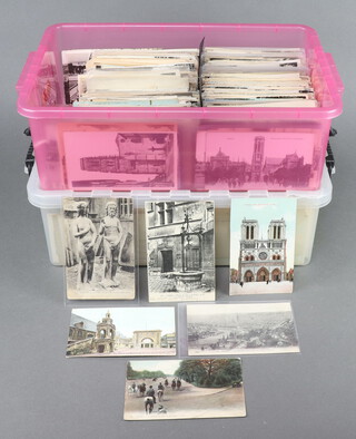 Approximately 2400 black and white and coloured postcards of France (contained in 2 plastic crates) 
