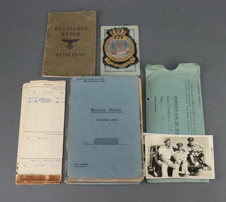 Two 1960's Royal Navy flying log books, mostly 81424 squadron Royal Naval Air Service and a German passport  