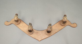 A Victorian coat rack the hooks in the form of antelope slots 110cm 