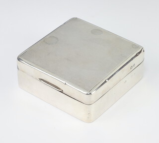 An Art Deco silver engine turned cigarette box Birmingham 1937 8cm 
