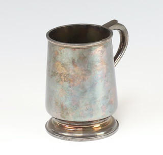 A silver mug of plain form with engraved monogram, Sheffield 1946, 253 grams 