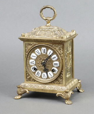 A French style striking mantel clock with Roman numerals contained in a gilt metal case 25cm h x 15cm w x 13cm d 