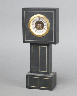 A West German timepiece in the form of a longcase clock with 5cm dial contained in a slate case 24cm x 11cm x 4cm 
