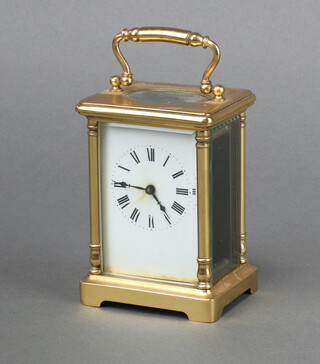 A 19th/20th Century carriage timepiece with 6cm enamelled dial, Roman numerals, contained in a gilt metal case 11cm h x 8cm w x 6cm d (no key) 