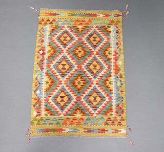 A yellow, turquoise and white ground Chobi Kilim rug 120cm x 80cm 