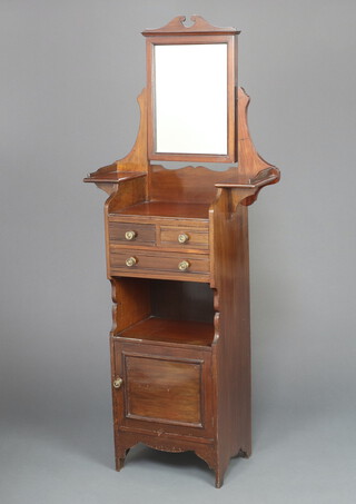 An Edwardian mahogany ships style dressing table with rectangular bevelled plate mirror to the back above a recess with 3/4 gallery, fitted 2 short and 1 long drawer above a recess, the base fitted a cupboard enclosed by panelled door 162cm h x 64cm w x 32cm 