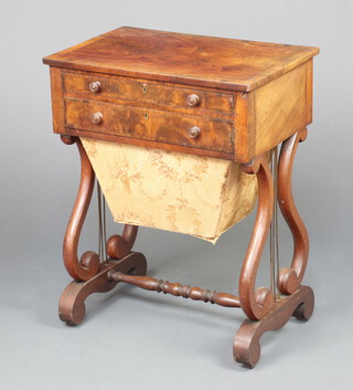 A Victorian rectangular mahogany work table with quarter veneered top fitted 2 drawers above a deep basket, raised on lyre supports 73cm h x 57cm w x 58cm d 