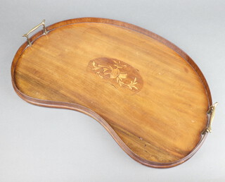An Edwardian kidney shaped inlaid mahogany tea tray, the centre inlaid musical trophies 58cm x 34cm 