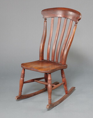 A 19th Century beech and elm stick and bar back rocking chair 193cm h x 31cm w x 62cm d (seat 26cm x 26cm) 