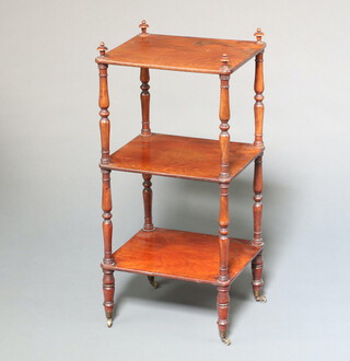 A Victorian rectangular mahogany 4 tier what-not raised on turned supports, brass caps and casters 80cm h x 38cm w x 32cm d 