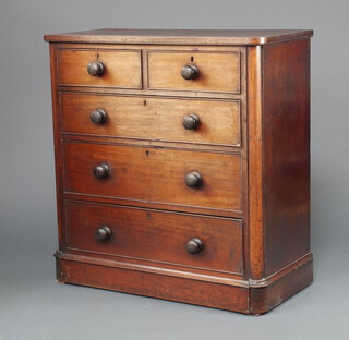 A Victorian bleached mahogany D shaped chest of 2 short and 3 long drawers with turned handles, raised on a platform base 104cm h x 99cm w x 47cm d.  