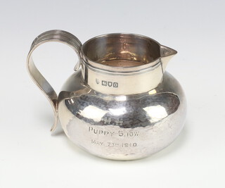 A Victorian silver baluster jug with simple handle, engraved inscription, London 1896, 206 grams 