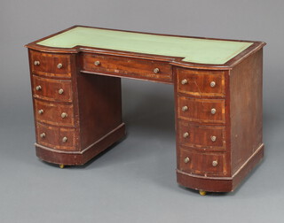 A Victorian mahogany dressing table with green inset writing surface above 1 long drawer and 8 short drawers with gilt metal handles 71cm h x 120cm w x 54cm d 