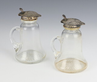 A pair of silver mounted glass spirit bottles Birmingham 1912 9.5cm 