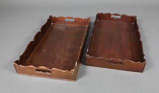 A pair of 19th Century rectangular mahogany Chippendale style twin handled trays 8cm x 53cm x 31cm