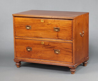 A 19th Century camphor military style chest of 2 long drawers with brass countersunk handles and replacement brass handles to the sides, raised on bun feet 67cm h x 82cm w x 47cm d 